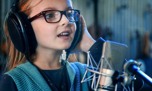 Kid,Singing,In,Studio.little,Girl,Singing,A,Song.front,View,Close